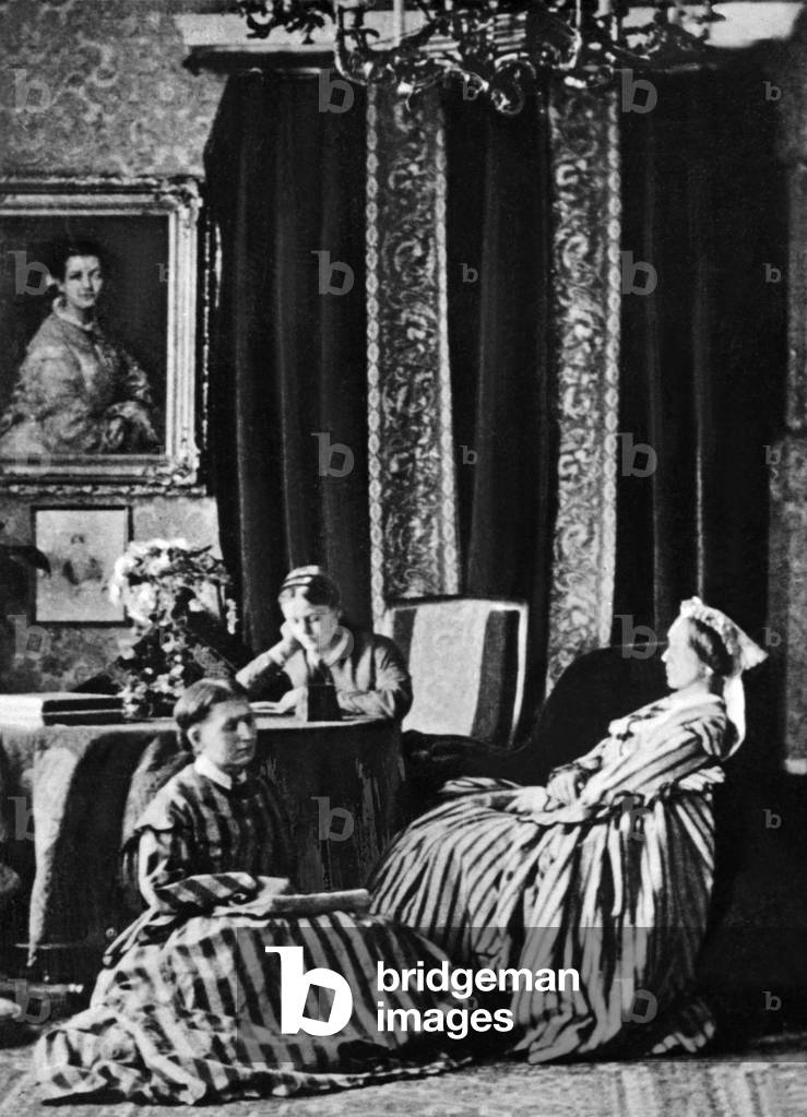 Mother and daughters of a middle-class family, 1880 (b/w photo)