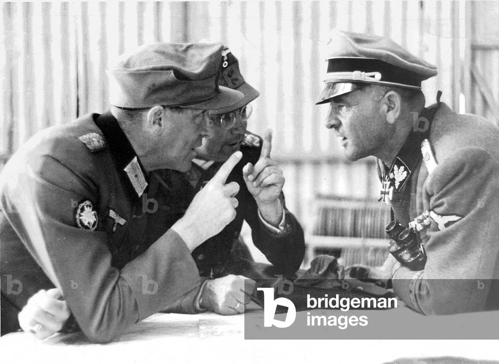 Sepp Dietrich in discussion with officers in Greece, 1941 (b/w photo)