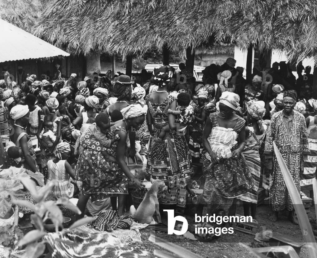 Village meeting on a market place in Gbeika, 1963 (b/w photo)