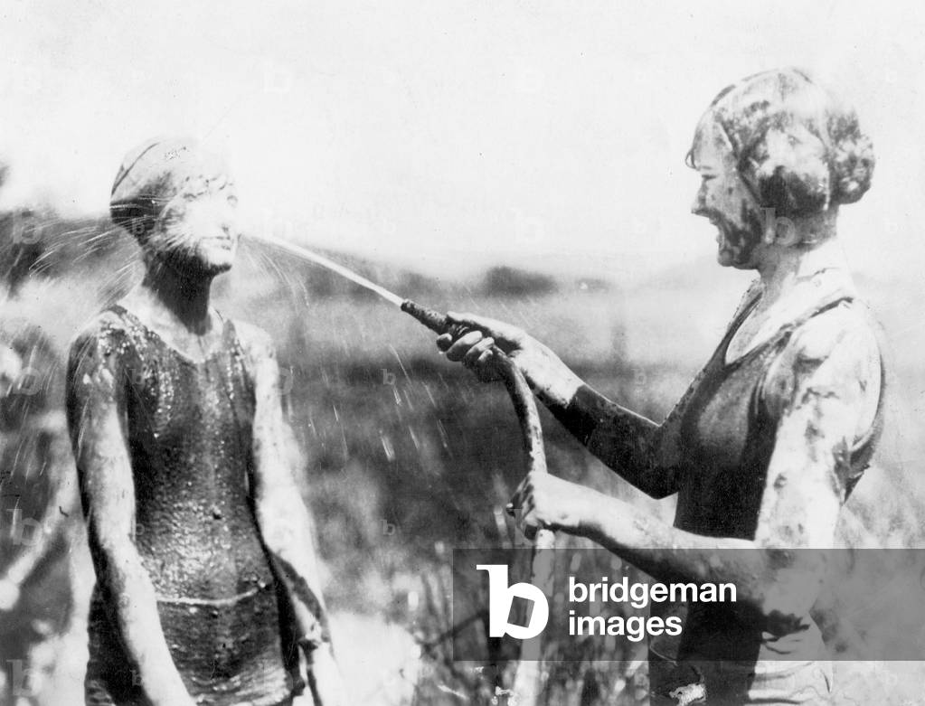 Shower after the mud bath, 1923 (b/w photo)