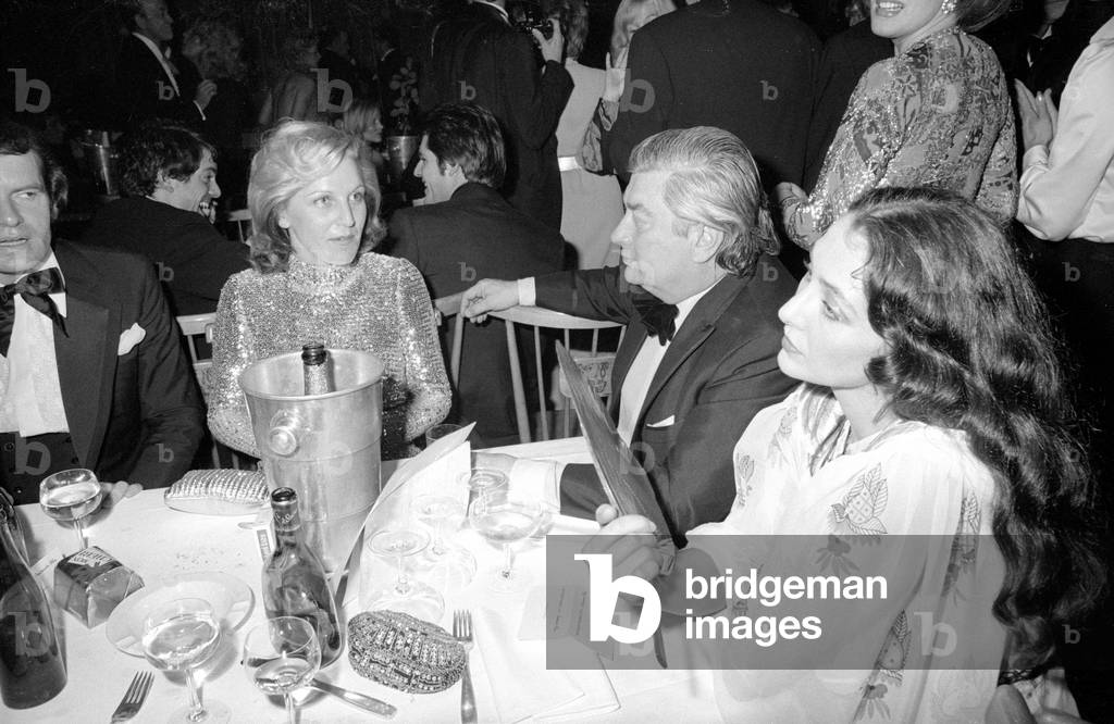 Wolfgang Overath, Brigitte Beckenbauer and Christine Kaufmann at the German Film Ball in Munich, 1974 (b/w photo)