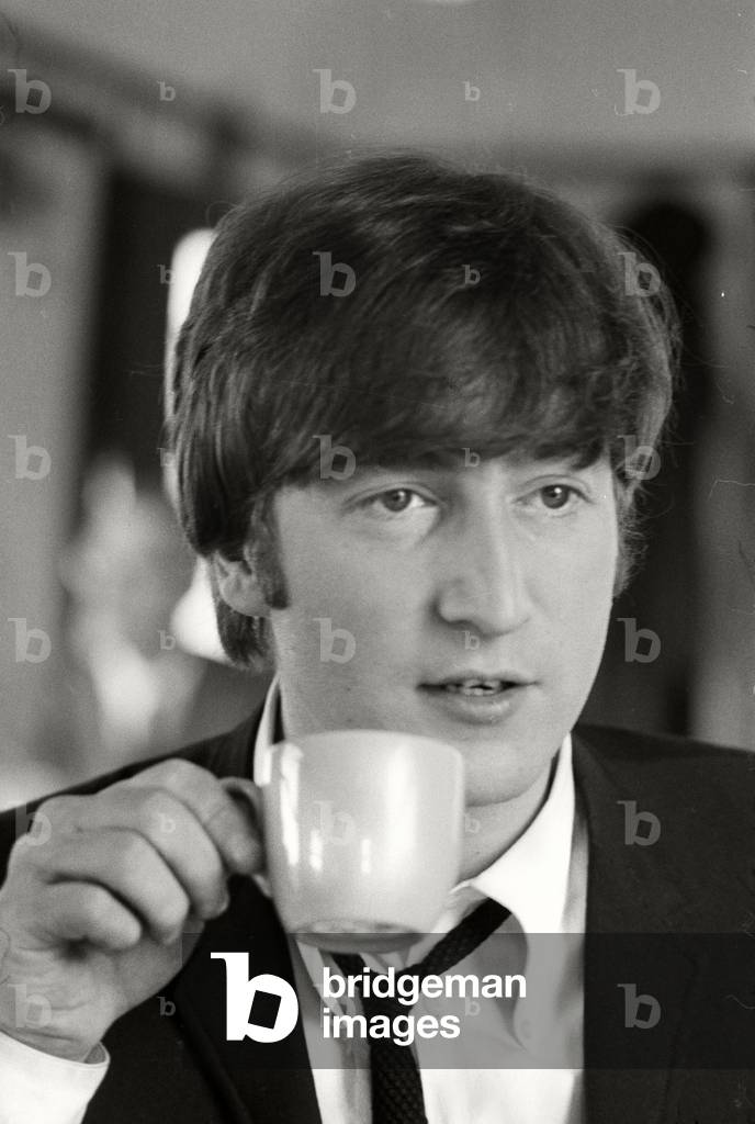 John Lennon of The Beatles during the 'Hard Day's Night' promotion camaign, 1964 (b/w photo)