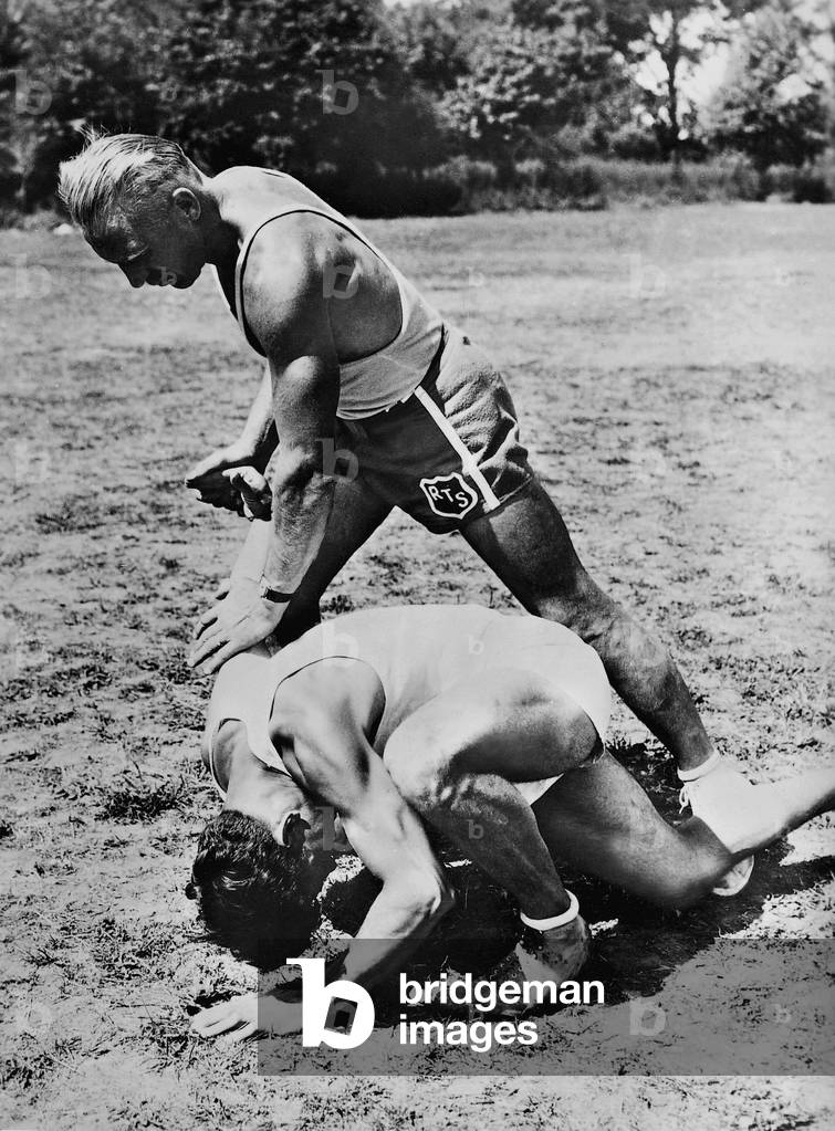 Policemen during close combat training, 1932 (b/w photo)