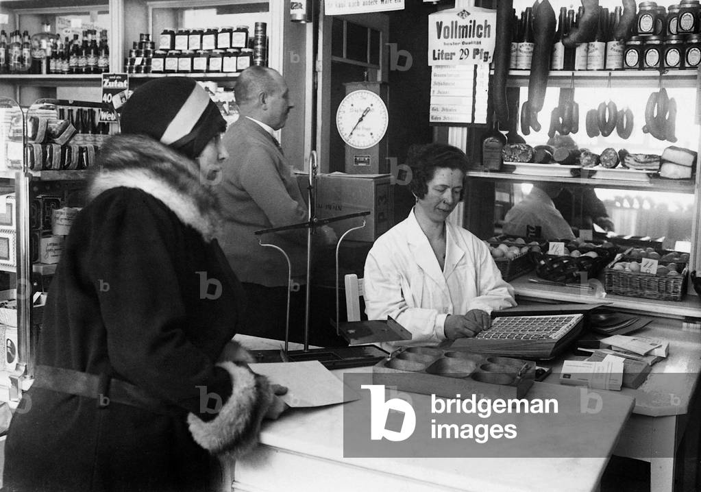 Post agency in a colonial store, 1929 (b/w photo)