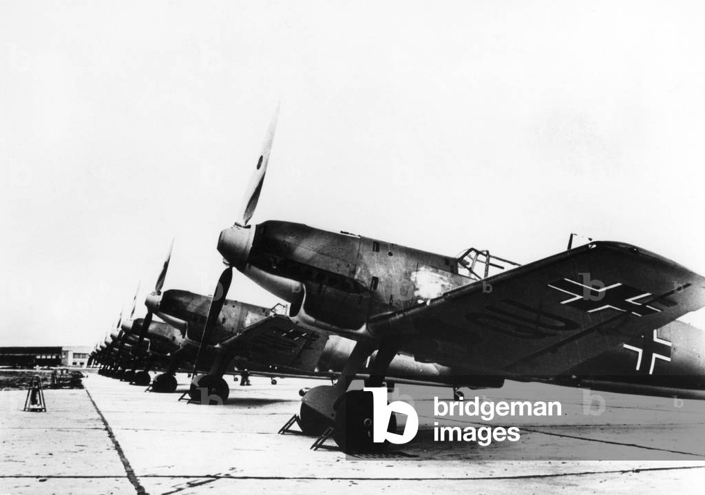 Fired hunting aircraft in front of workshops