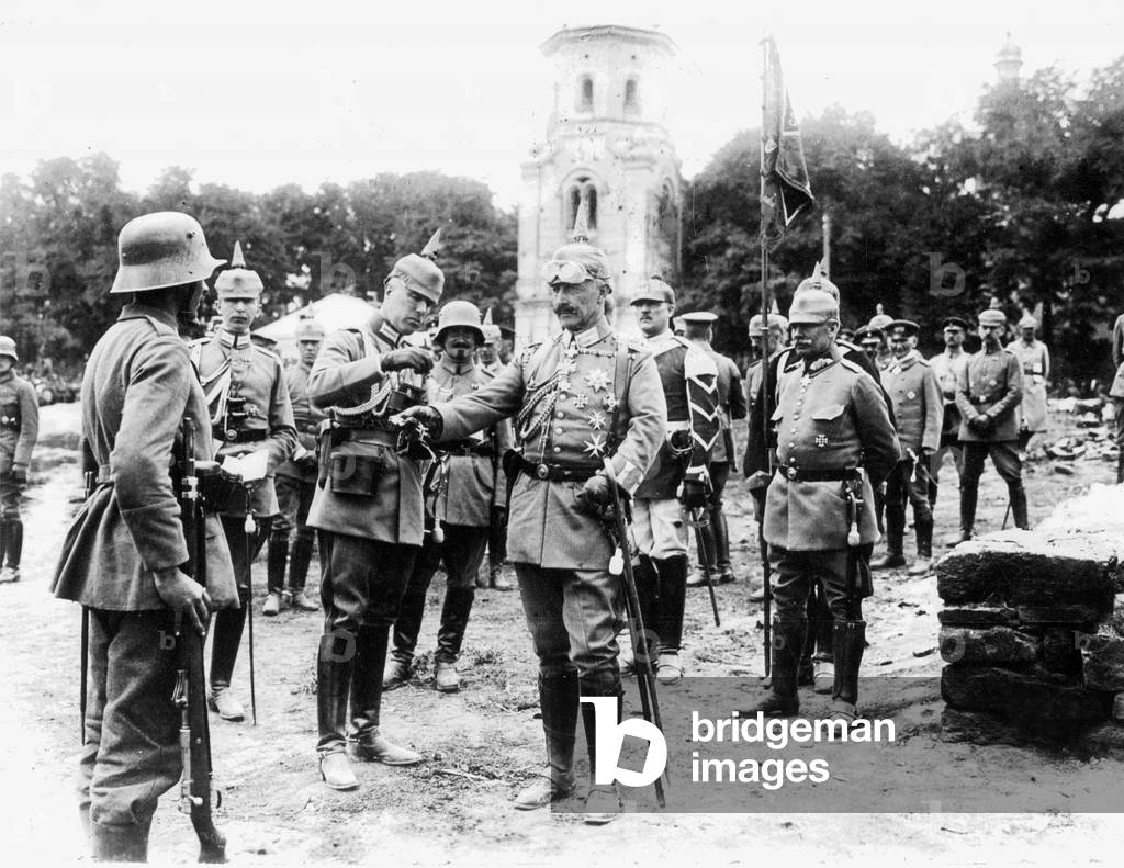 Kaiser Wilhelm II decorates soldiers at the Eastern front, 1917 (b/w photo)