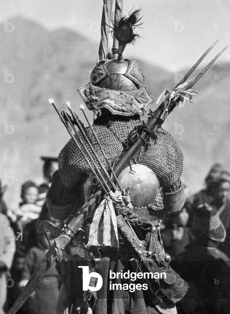 Tibetan warrior in Lhasa, 1938 (b/w photo)