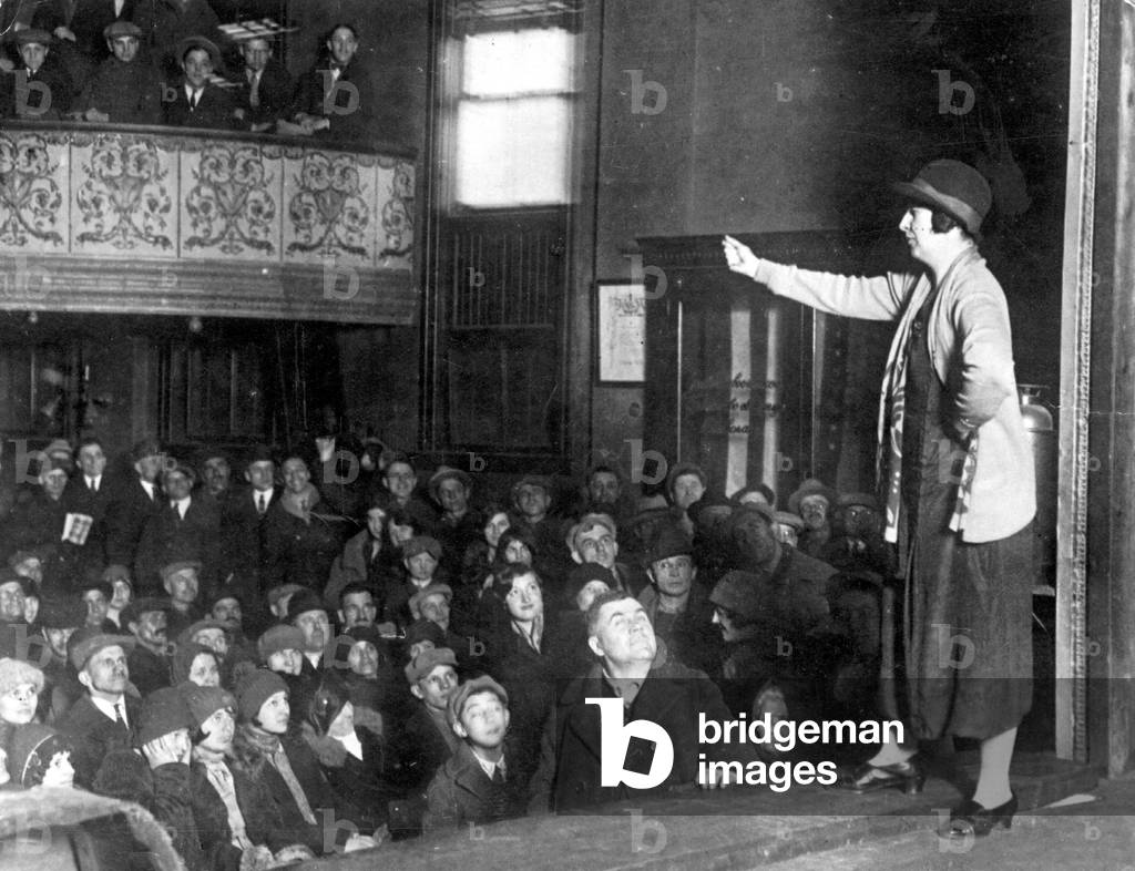 Speaker talks to striking mill workers, 1928 (b/w photo)