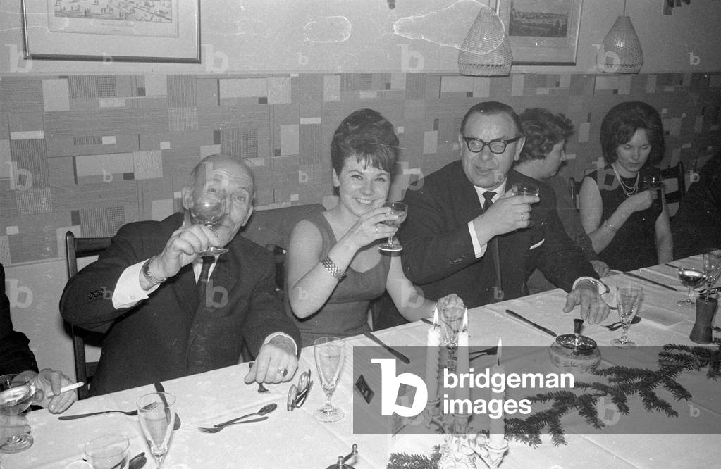 Christmas party at Burda in Munich, 1964 (b/w photo)