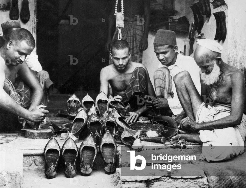 Indian shoemakers, 1931 (b/w photo)