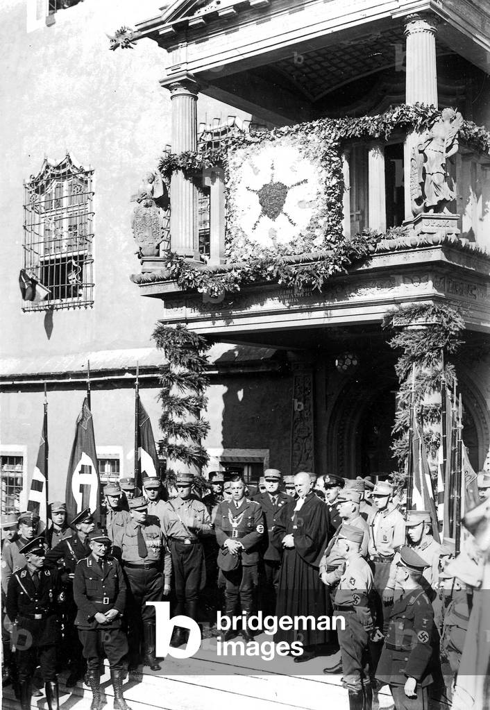 Reich Bishop Ludwig Mueller speaks in front of the Wittenberg city hall, 1933 (b/w photo)