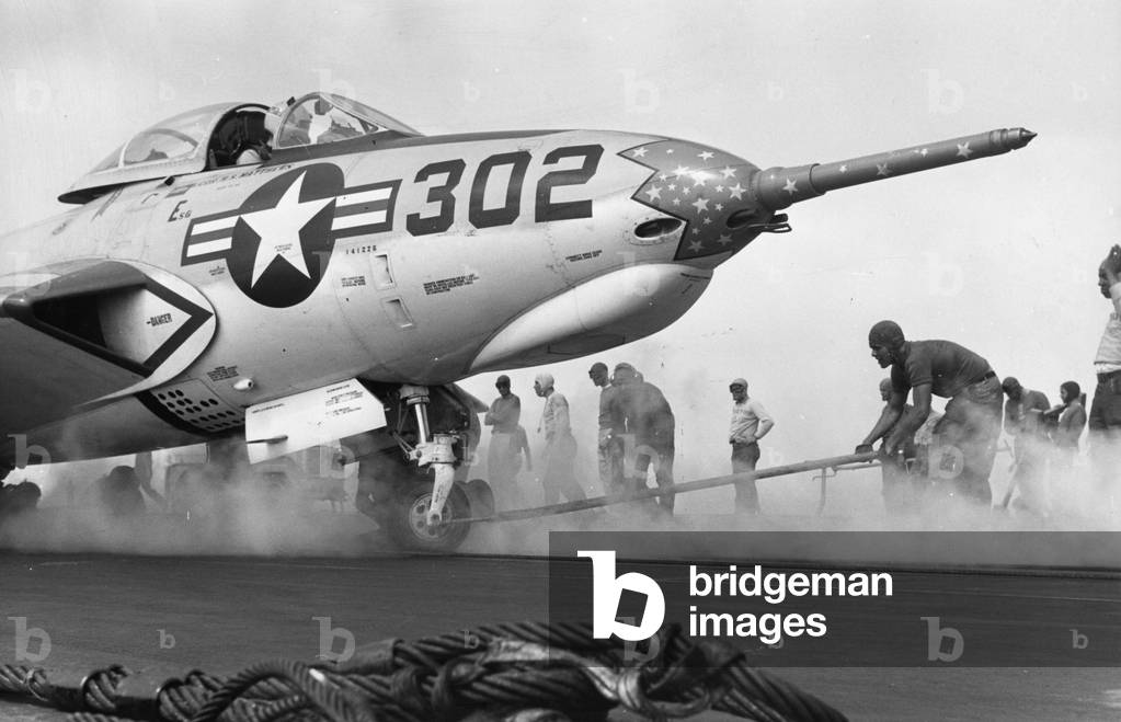 A plane on the aircraft carrier 'Forrestal', 1957 (b/w photo)