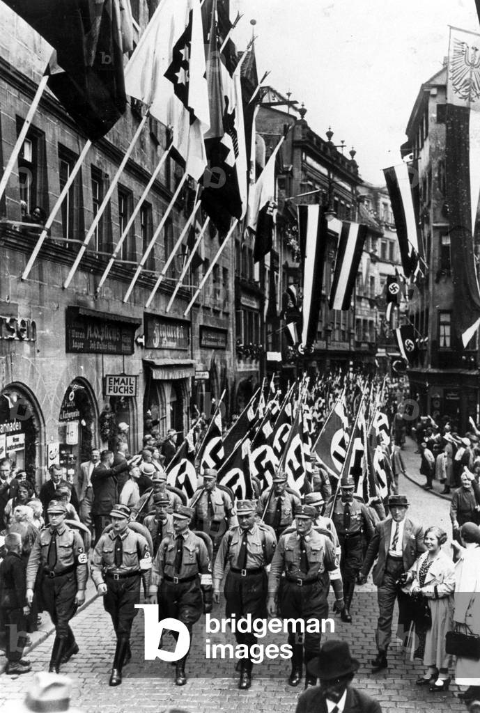 SA marches through Nuremberg, 1933 (b/w photo)