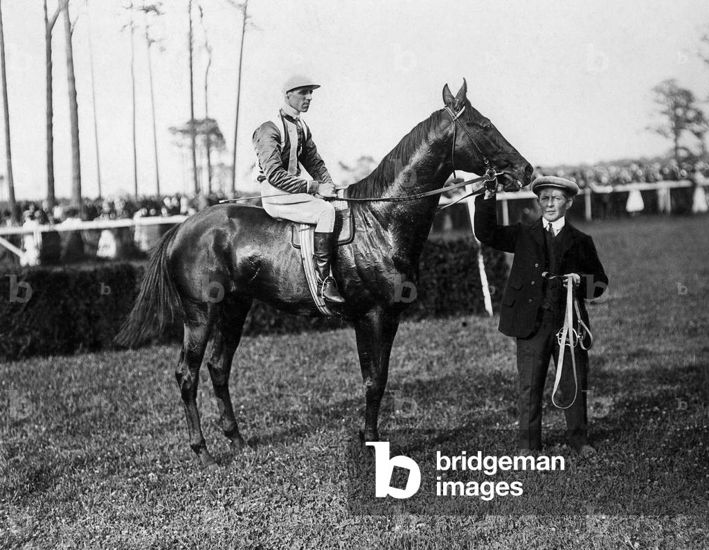 Jockey Childs with 'Fervor' at a horse race, 1910 (b/w photo)