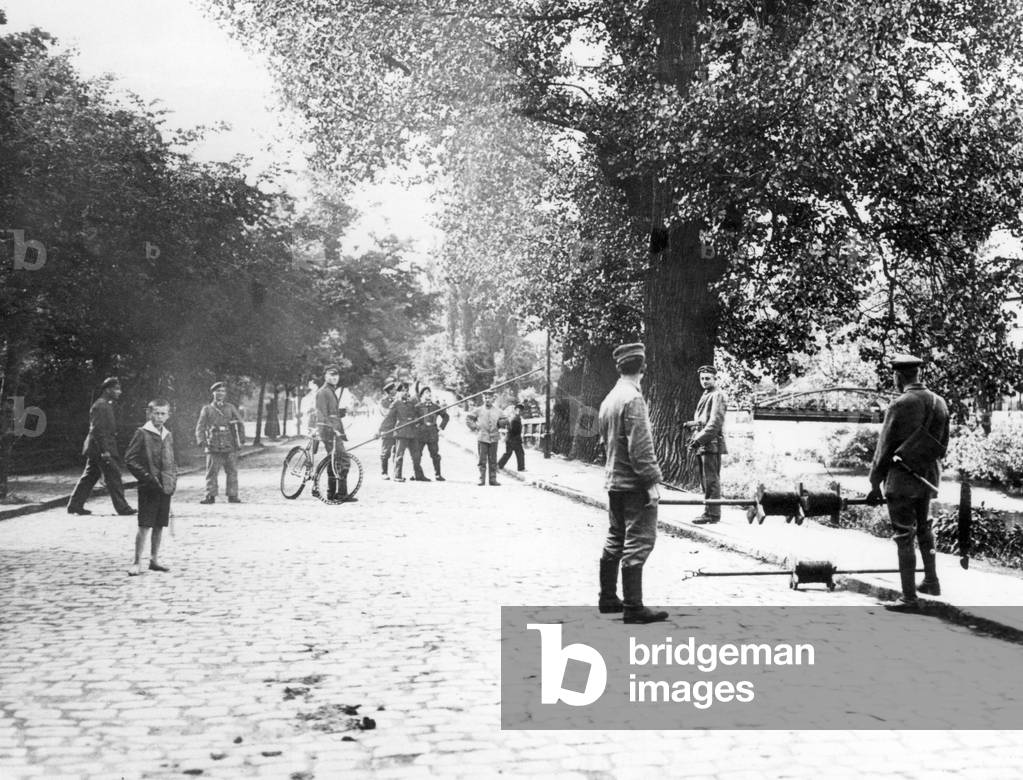 German border soldiers during the laying of a telephone line in Opole, Upper Silesia, 1919