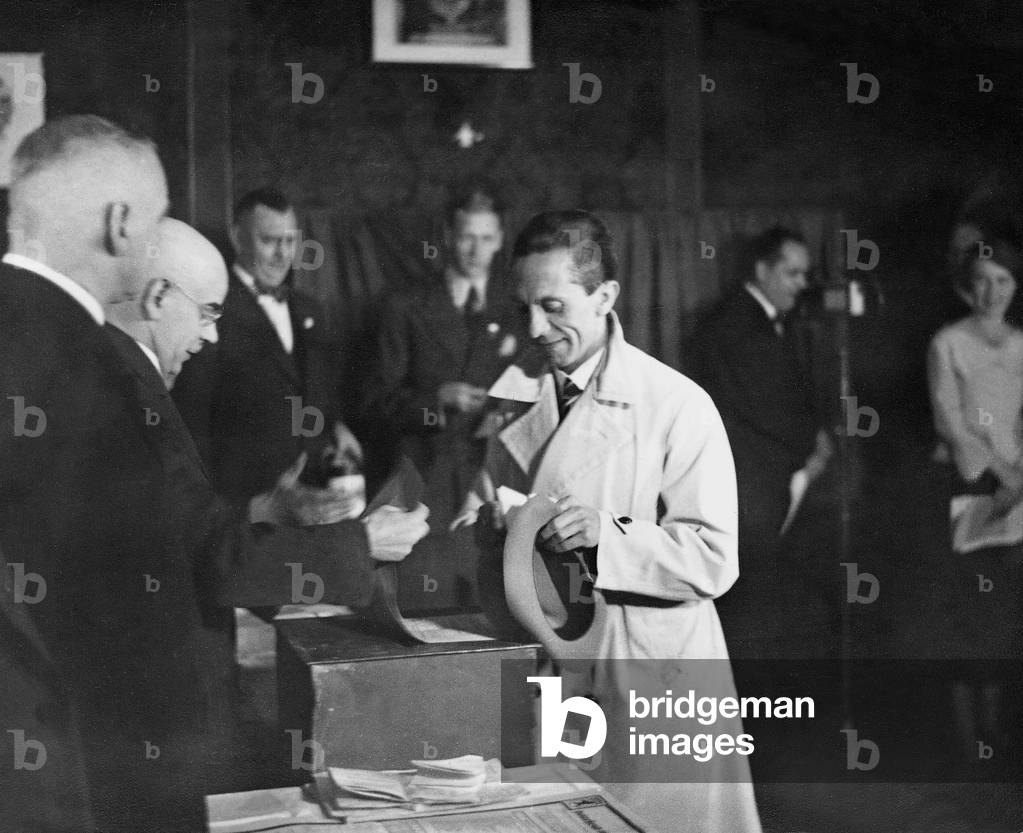 Joseph Goebbels in a polling station in Berlin, 1933 (b/w photo)