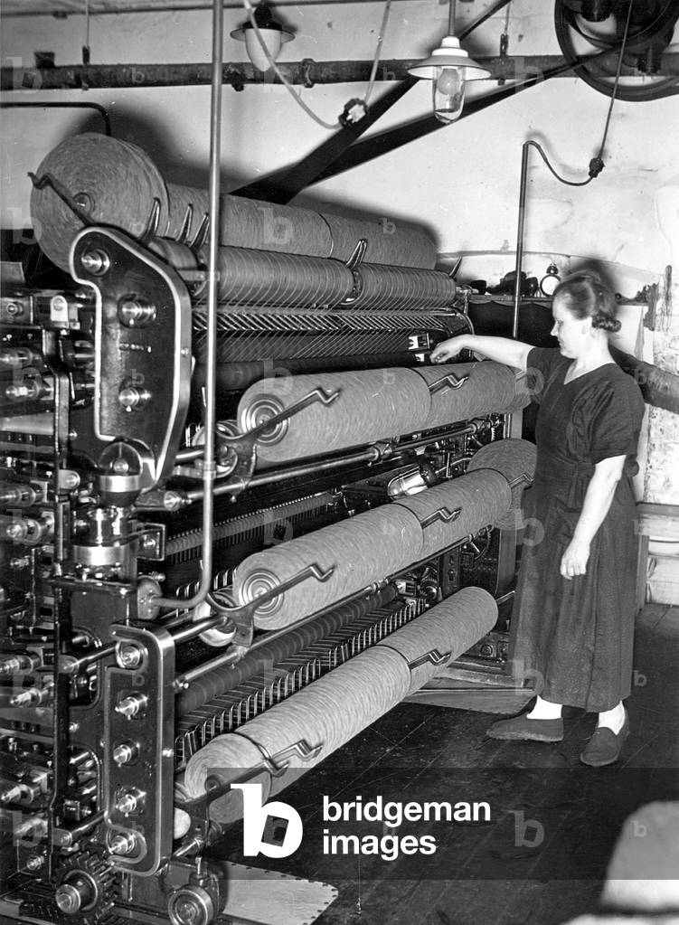 Woman in a weaving mill, 1941 (b/w photo)