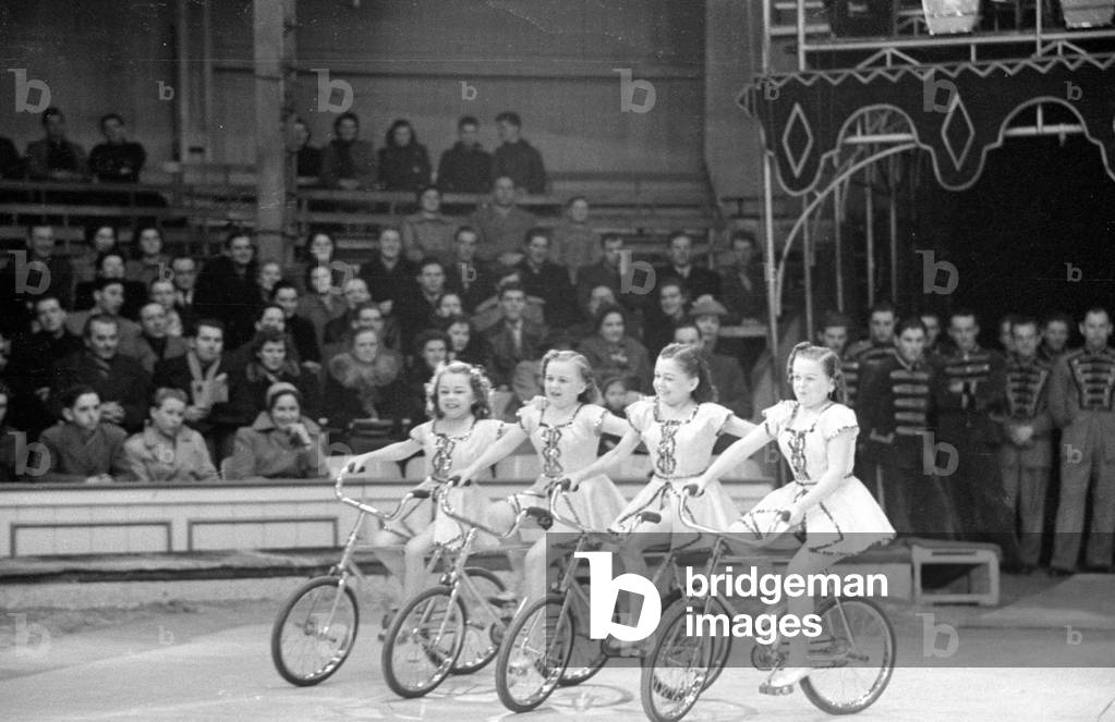 Midgets perform in a circus, 1953 (b/w photo)