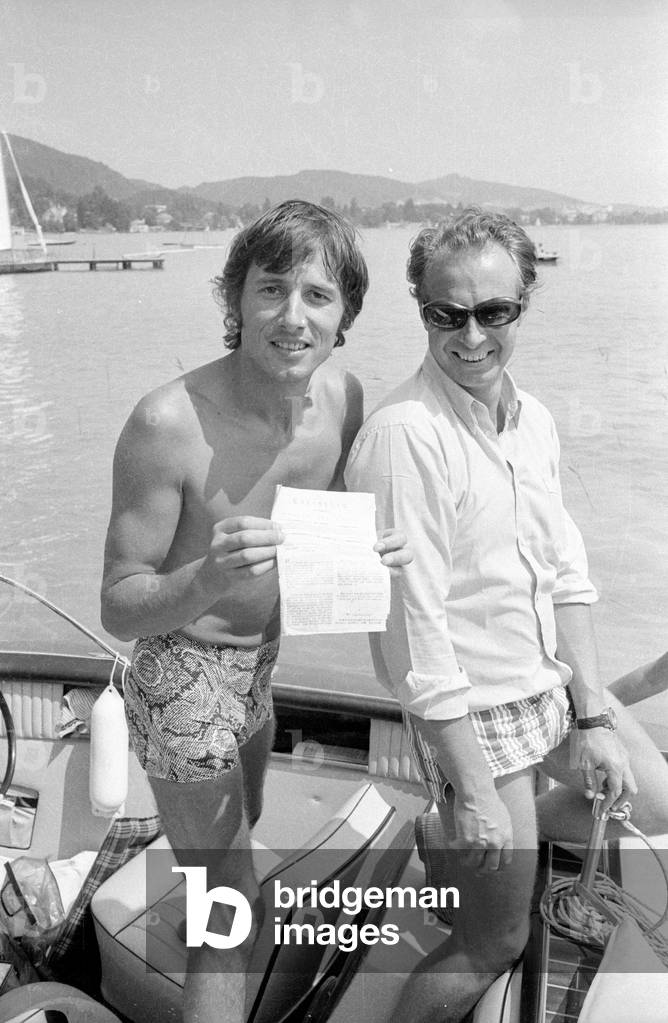 Udo Juergens on a motor boat at Woerthersee, 1969 (b/w photo)