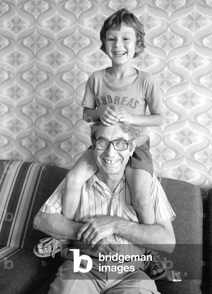 Child and grandfather, 1974 (b/w photo)