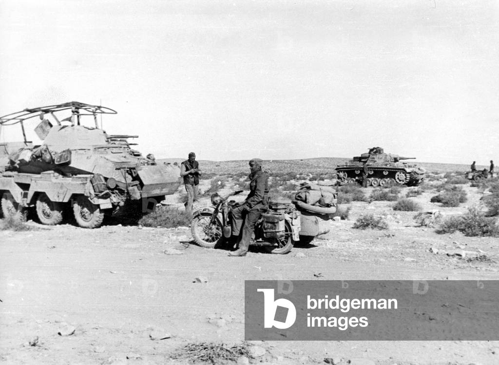 Armored reconnaissance vehicle and Panzer III of the Africa Corps, 1942 (b/w photo)