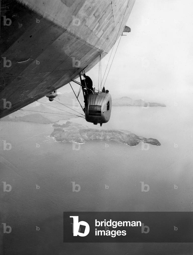 Mechanic in a motor gondola of the airship 'Graf Zeppelin', 1928 (b/w photo)