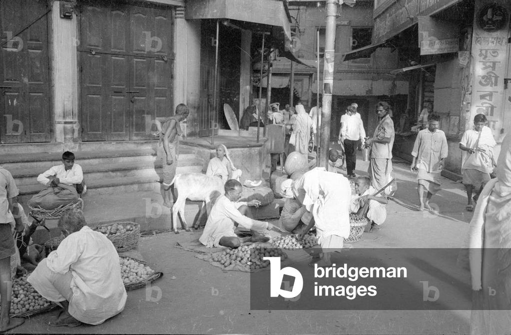 Street vendor in Benares, 1966 (b/w photo)