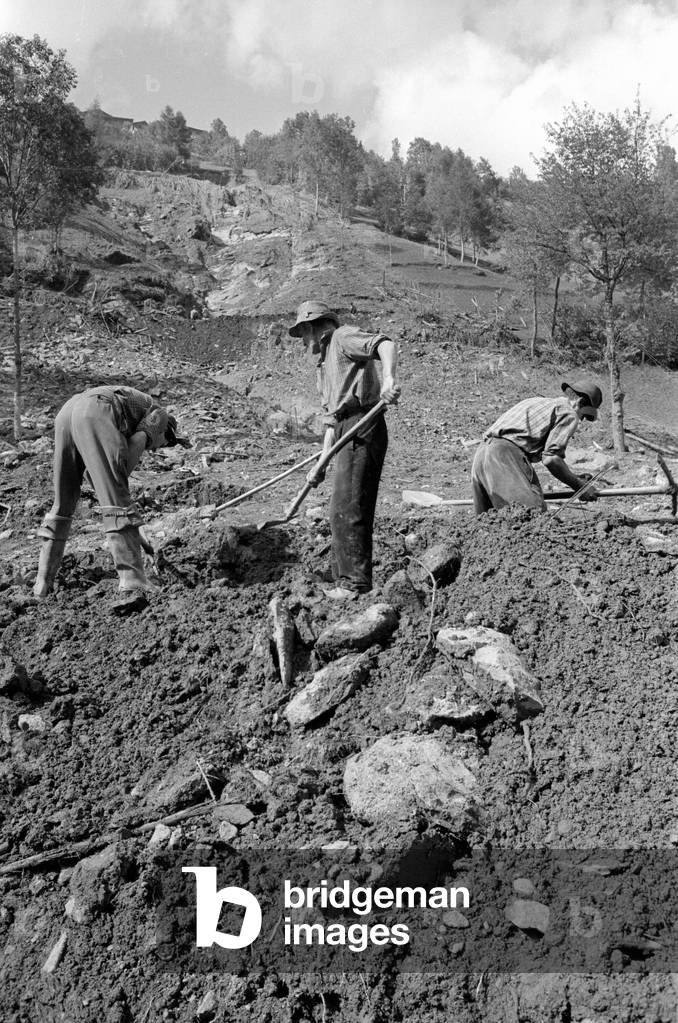 Helper on a slipped slope, 1960 (b/w photo)