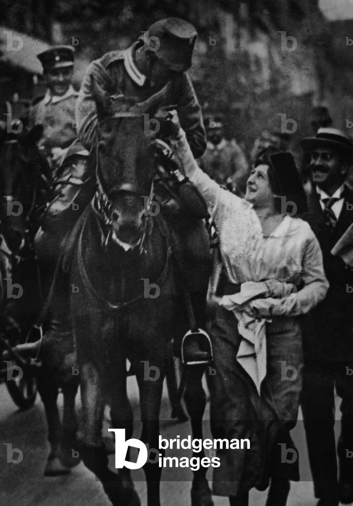 A German woman sends off a soldier to the front following the outbreak of WWI, Berlin, 1914 (b/w photo)