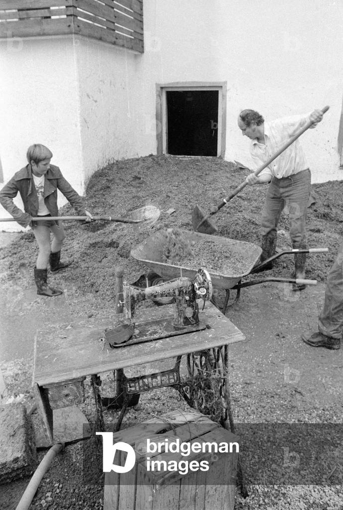 Cleaning up after a storm at Lake Chiemsee, 1974 (b/w photo)