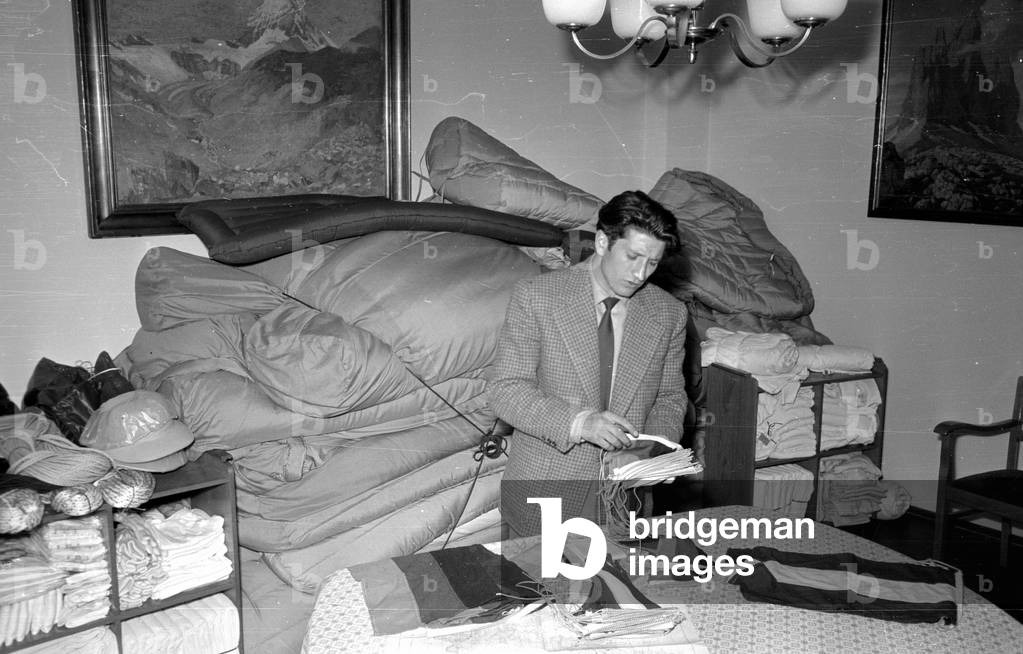 Mountaineer Mathias Rebitsch with his equipment, 1954 (b/w photo)