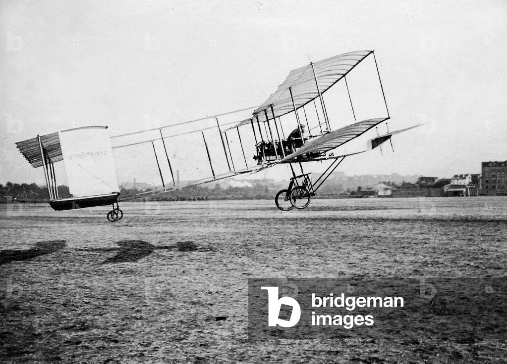 Henri Farman in his airplane, 1907 (b/w photo)