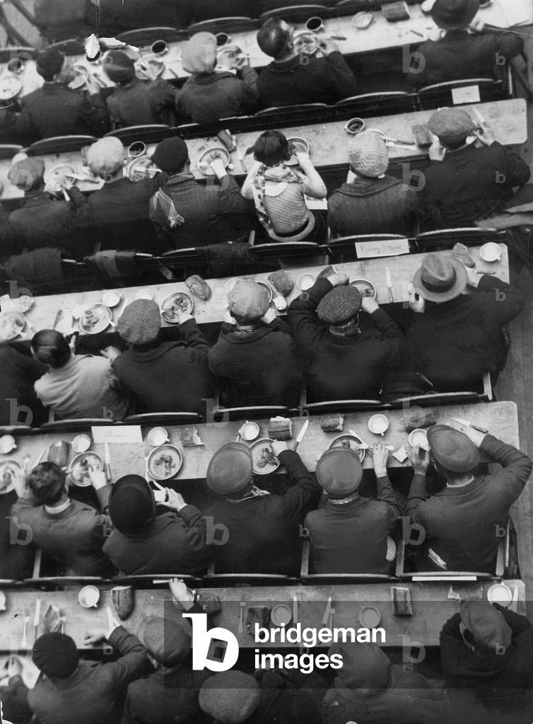 The feeding of unemployed in Berlin, 1933 (b/w photo)