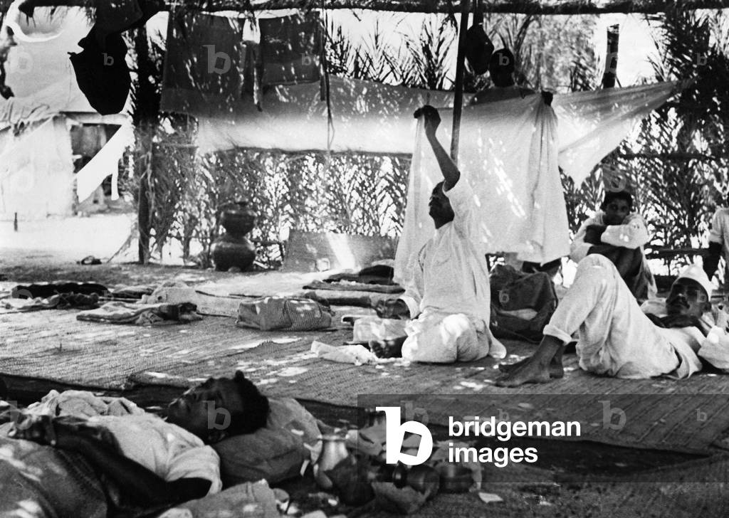 Afternoon rest during the 'Salt March', 1930 (b/w photo)