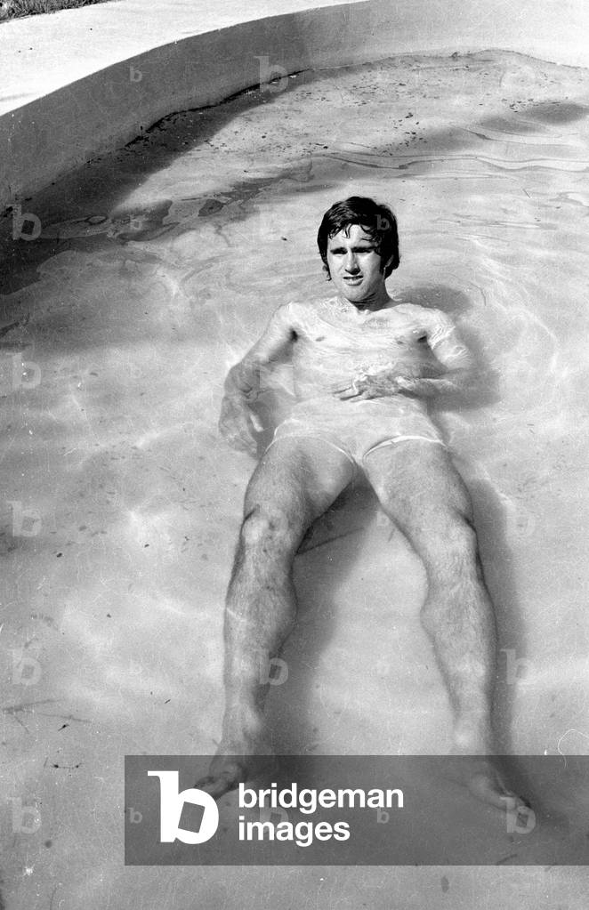 Gerd Mueller in the pool of the accommodation of the German team in Mexico, 1971 (b/w photo)