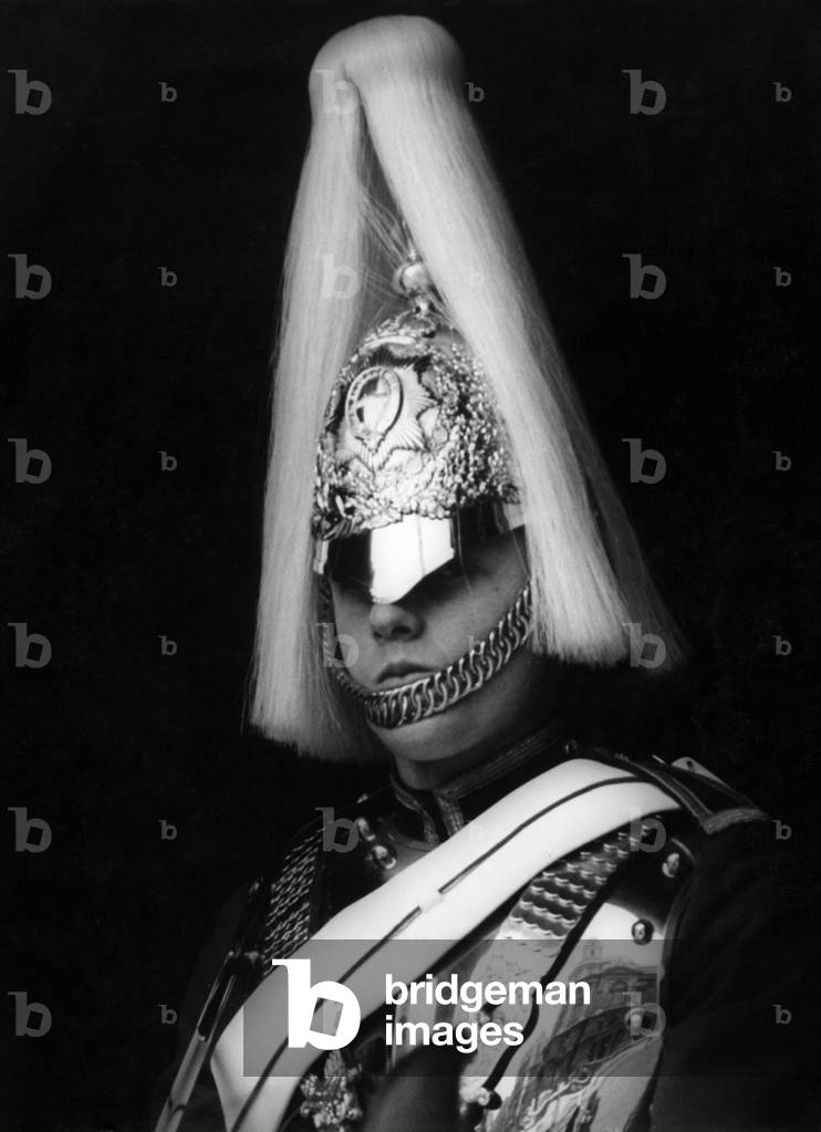 A soldier of the 'Household Cavalry Mounted Regiment' in London, 1967 (b/w photo)
