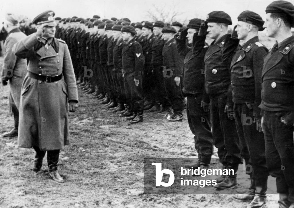 Heinz Guderian passes before the units of the Panzer troops, 1940 (b/w photo)