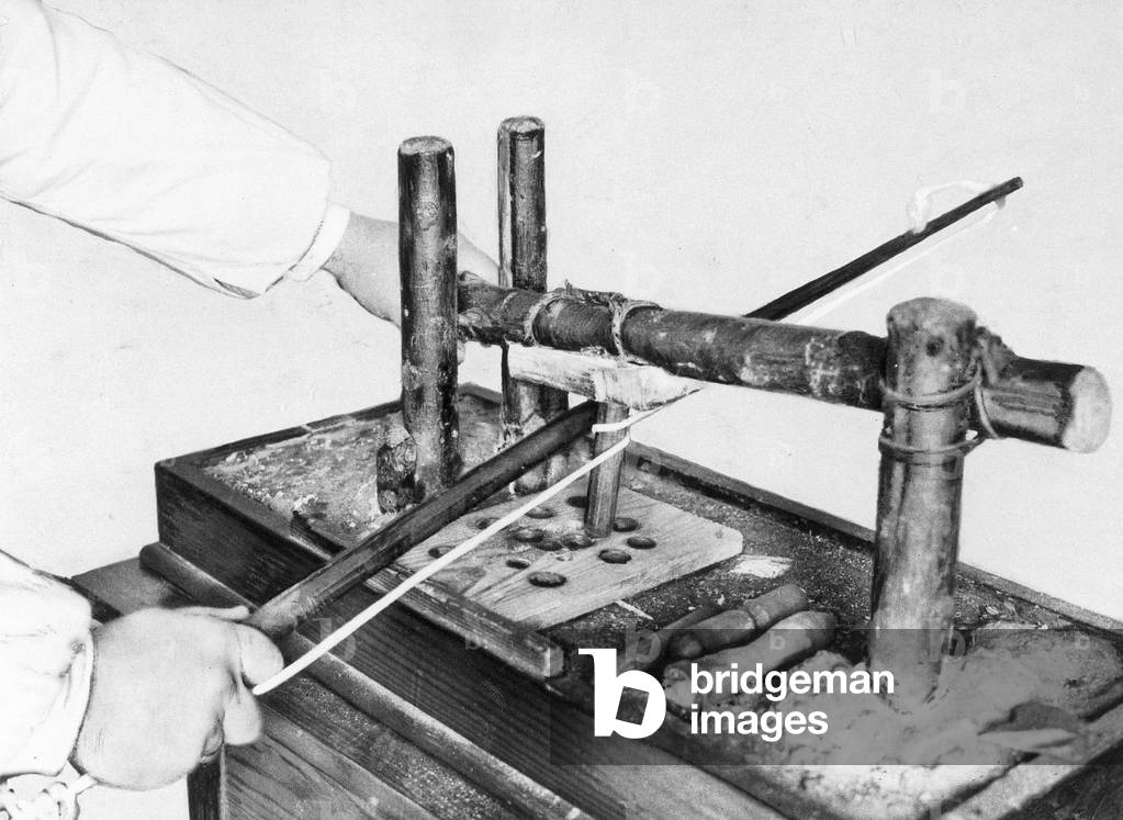 Bow drill from the Stone Age (b/w photo)