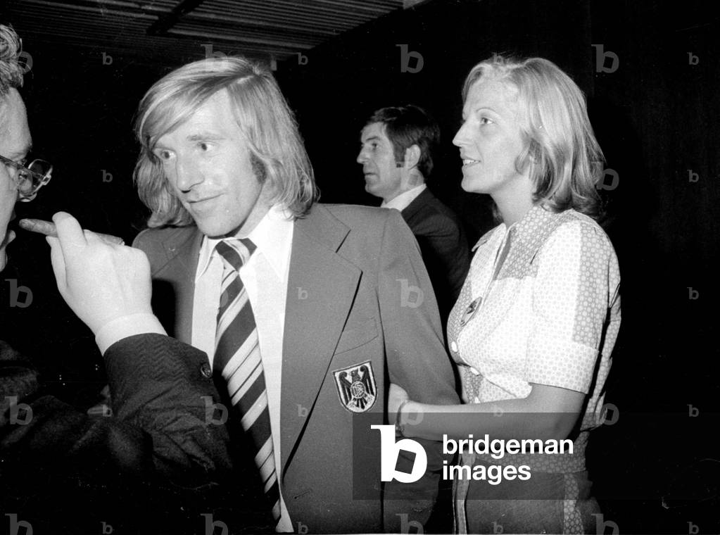 Günther Netzer and Brigitte Beckenbauer at the celebration of the World Cup victory in Munich, 1974 (b/w photo)
