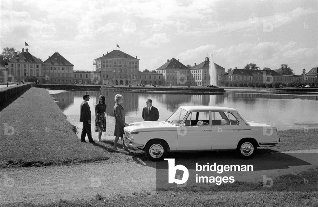 A BMW 1800 in the park of Nymphenburg Palace, 1963 (b/w photo)