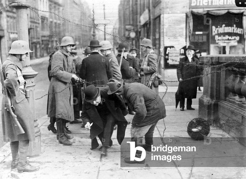 Passport control during the Spartacus uprising in Berlin, 1919 (b/w photo)
