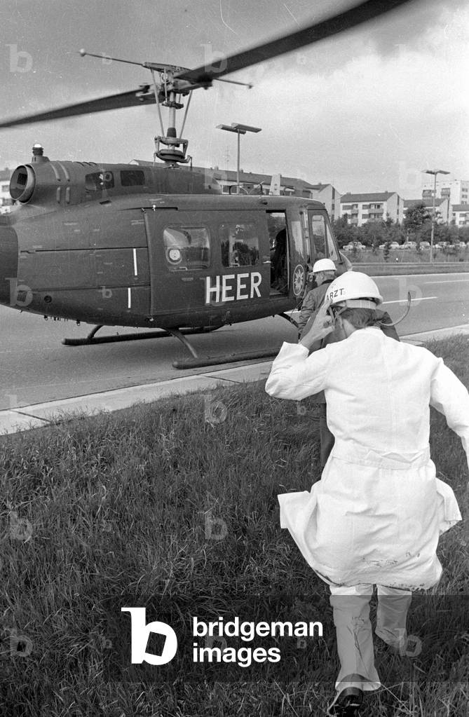 Rescue mission by helicopter near Munich, 1975 (b/w photo)