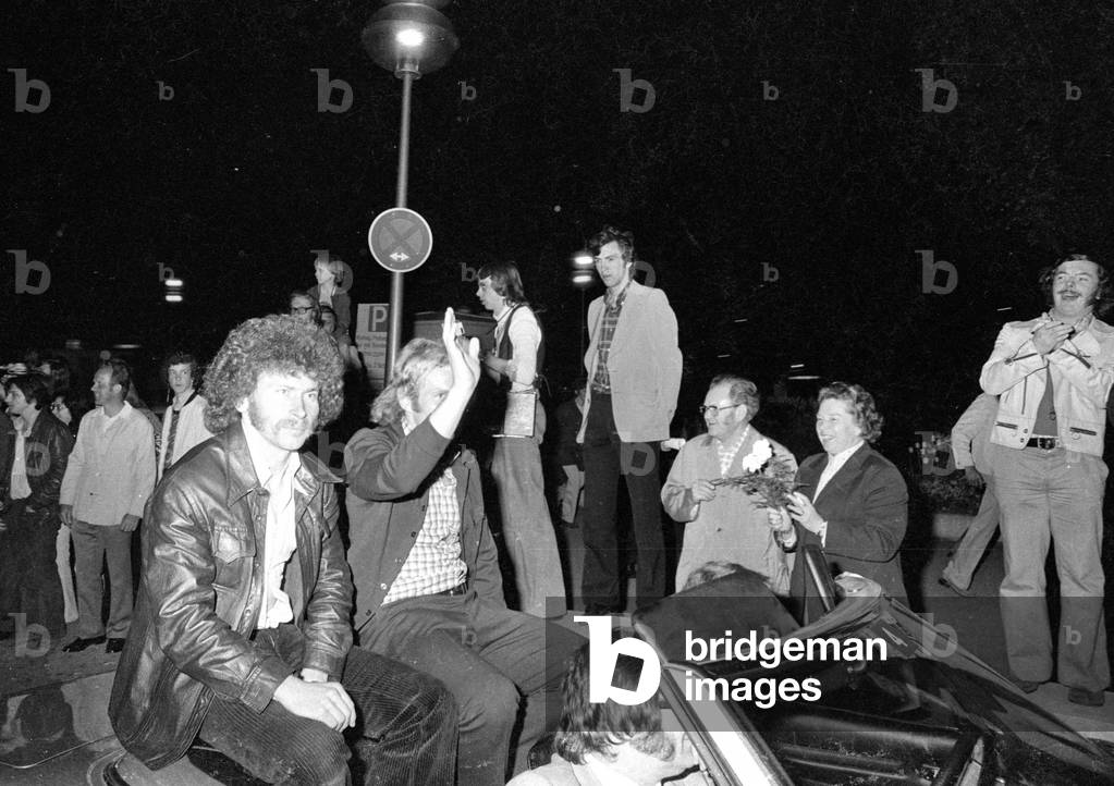 Paul Breitner and Uli Hoeneß at the celebration of FC Bayern on Marienplatz, 1974 (b/w photo)