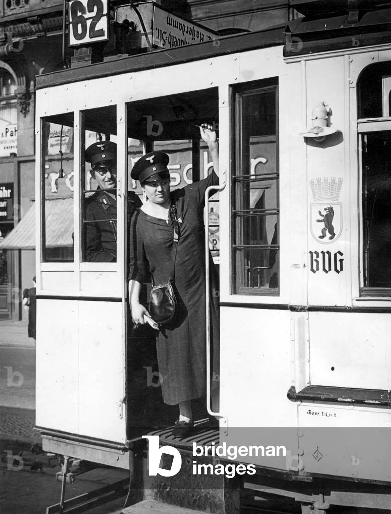 Female tram conductor in Berlin, 1939 (b/w photo)