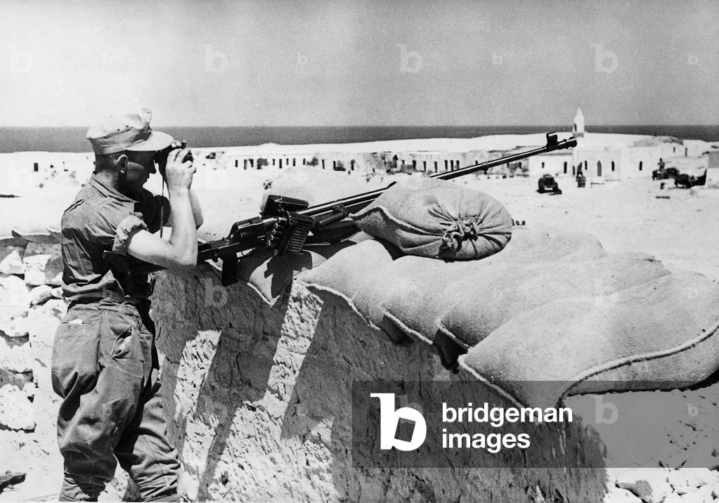 Soldiers of the German Africa Corps in a position at El Agheila, 1941 (b/w photo)