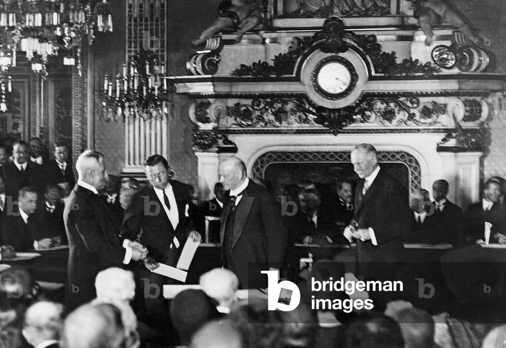 Gustav Stresemann at the signing of the Briand-Kellogg Pact, 1928 (b/w photo)