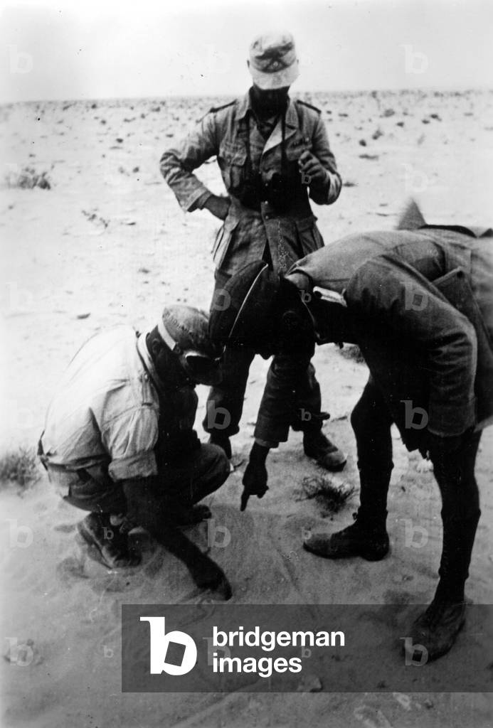 A briefing session among soldiers of the Africa Corps, 1942 (b/w photo)