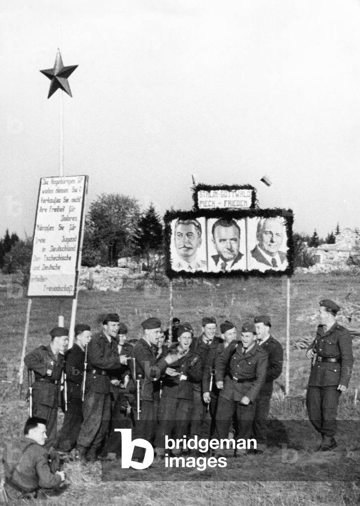 Czechoslovakian border soldiers agitate at the inner German border (b/w photo)