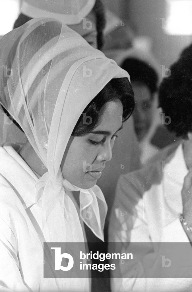 The Thai royal couple in a fish factory in Bremen, 1966 (b/w photo)