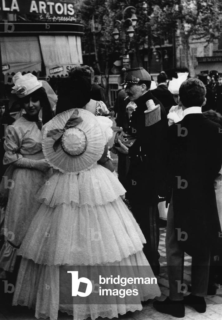 Women wearing ball dresses in France (b/w photo)